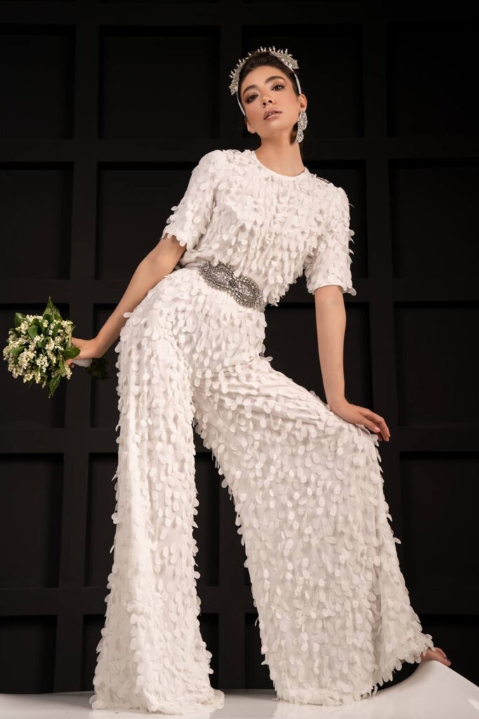 Exclusively hand made fabric white jumpsuit wide legged trousers and short sleeves - Image 4