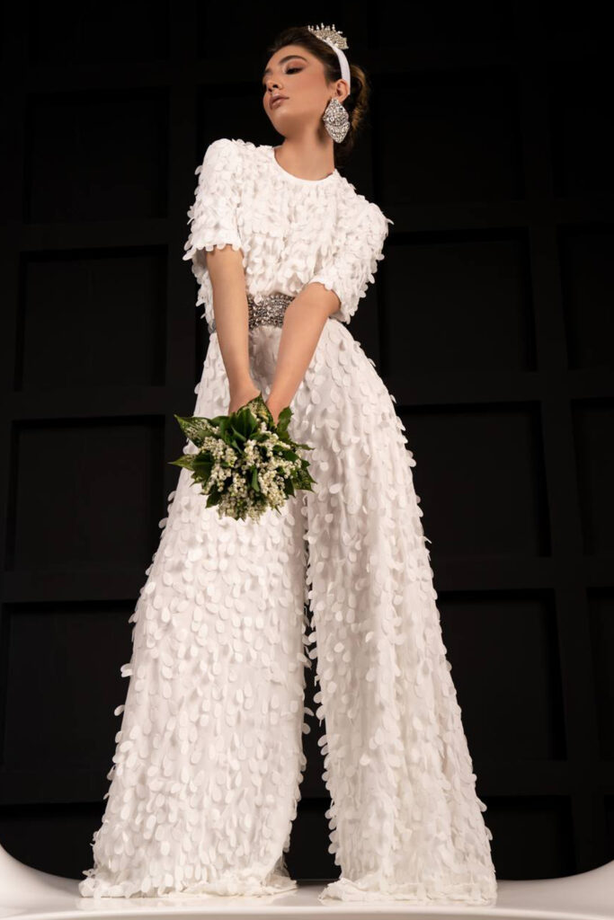 Exclusively hand made fabric white jumpsuit wide legged trousers and short sleeves - Image 5